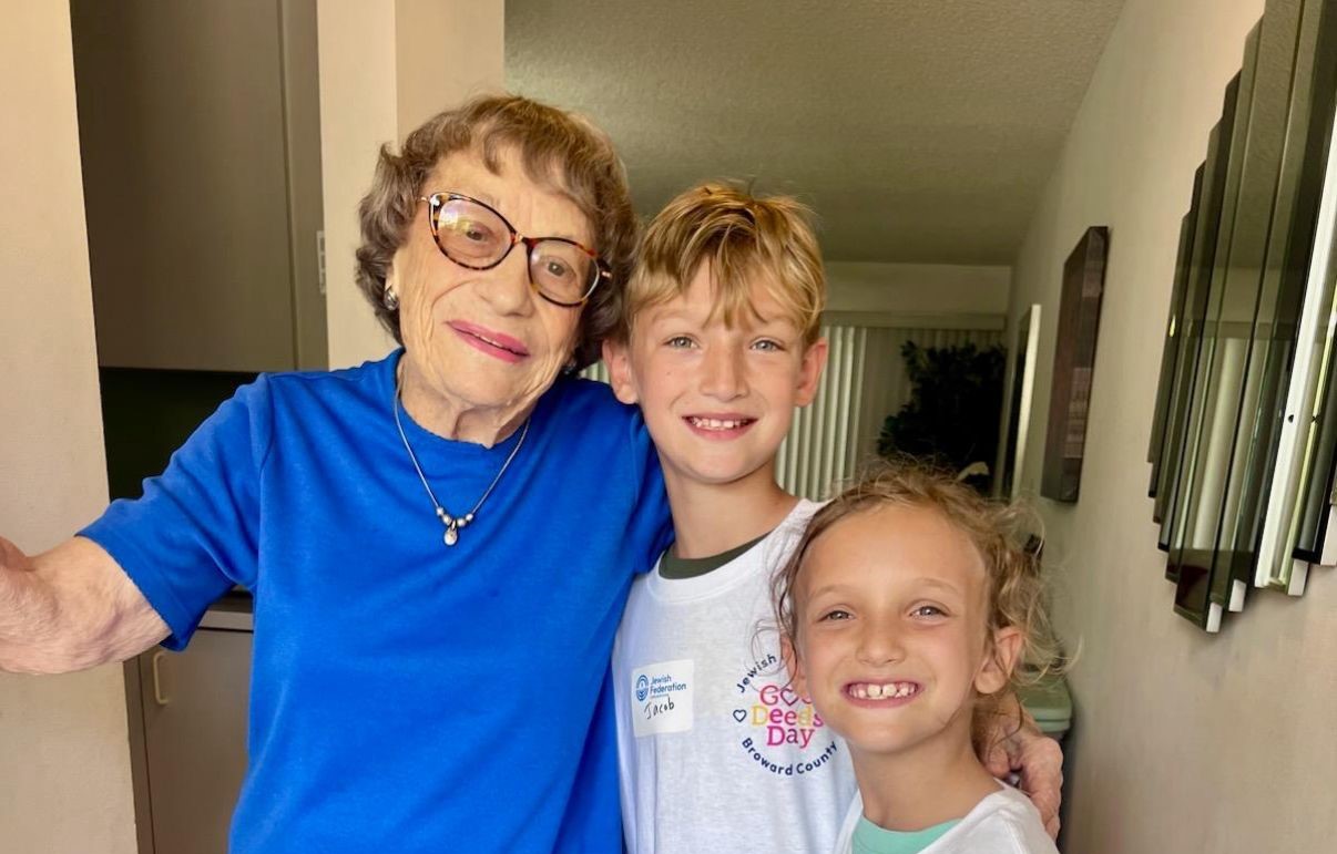 Volunteer visiting a senior at home